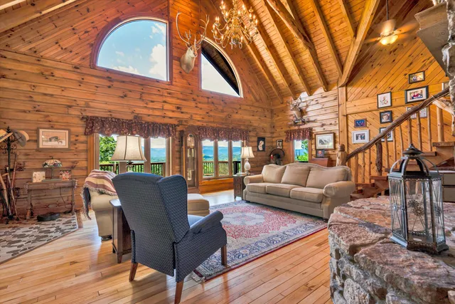 a view of a patio with a table and chairs