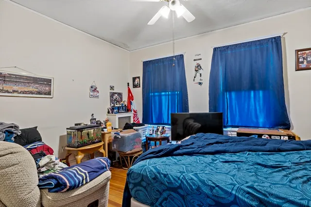a bedroom with a bed and closet