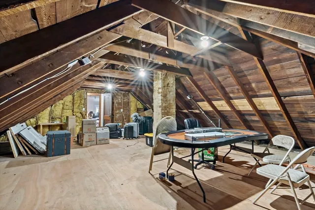 a view of a chairs and table in the patio