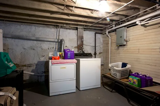 a storage room with washer and dryer