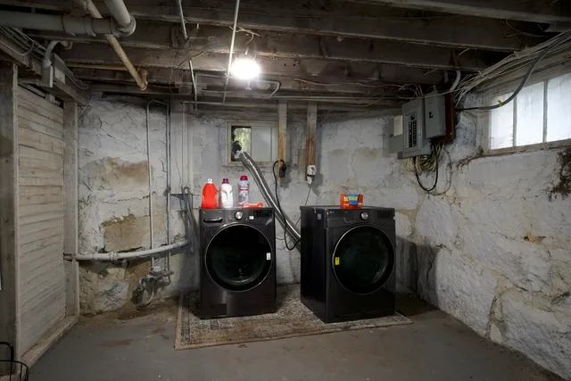 a view of an empty room with storage