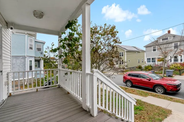 a view of a porch with furniture