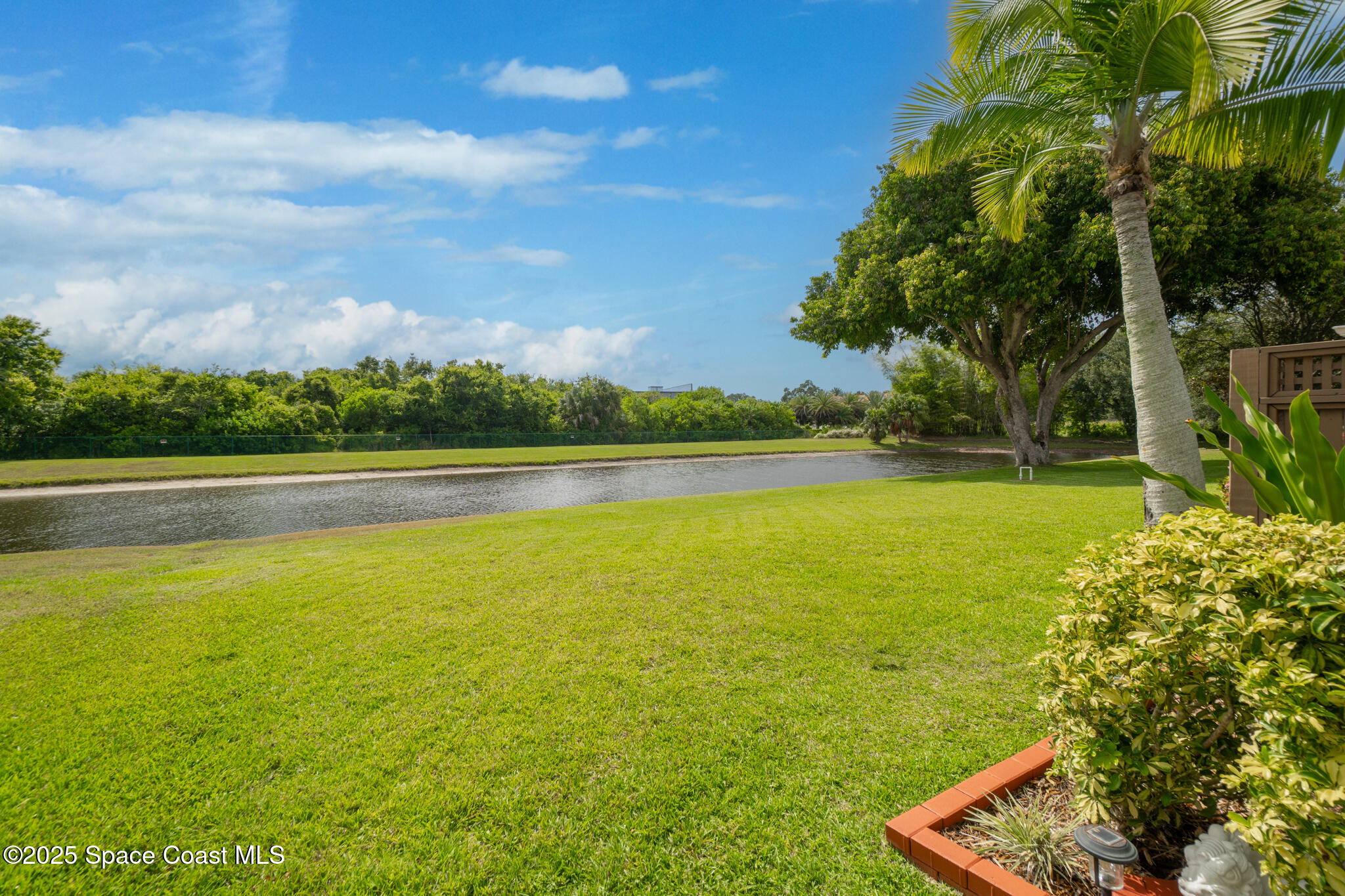 4808 Springwater Circle Melbourne, FL 32940 - Photo 31 of 38 a view of an ocean from a yard