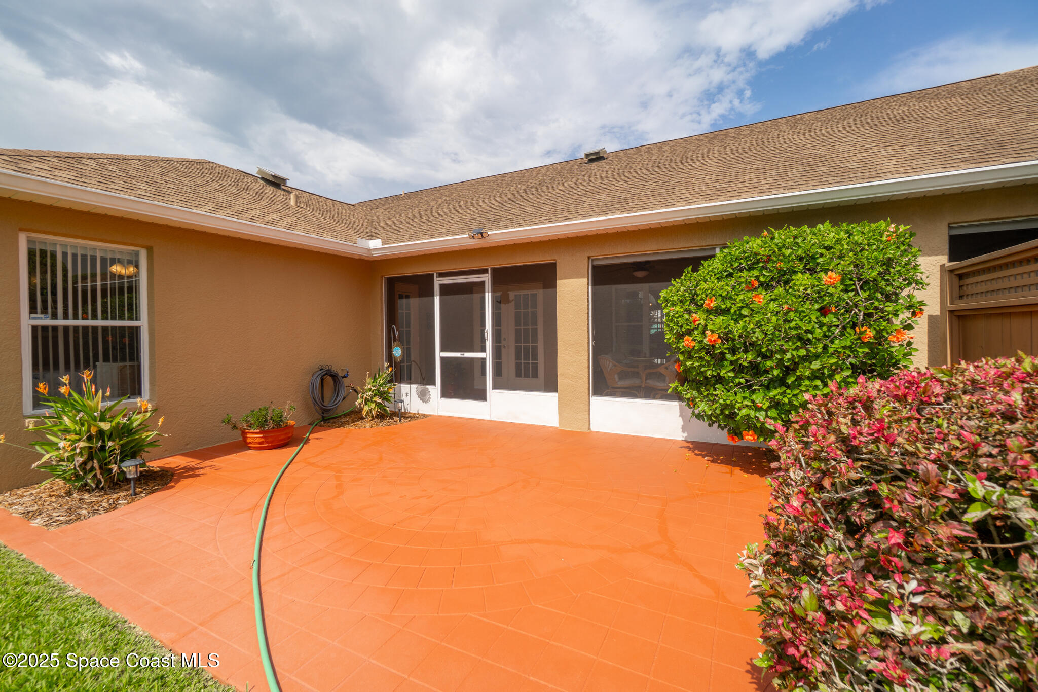 4808 Springwater Circle Melbourne, FL 32940 - Photo 32 of 38 a view of a house with a patio