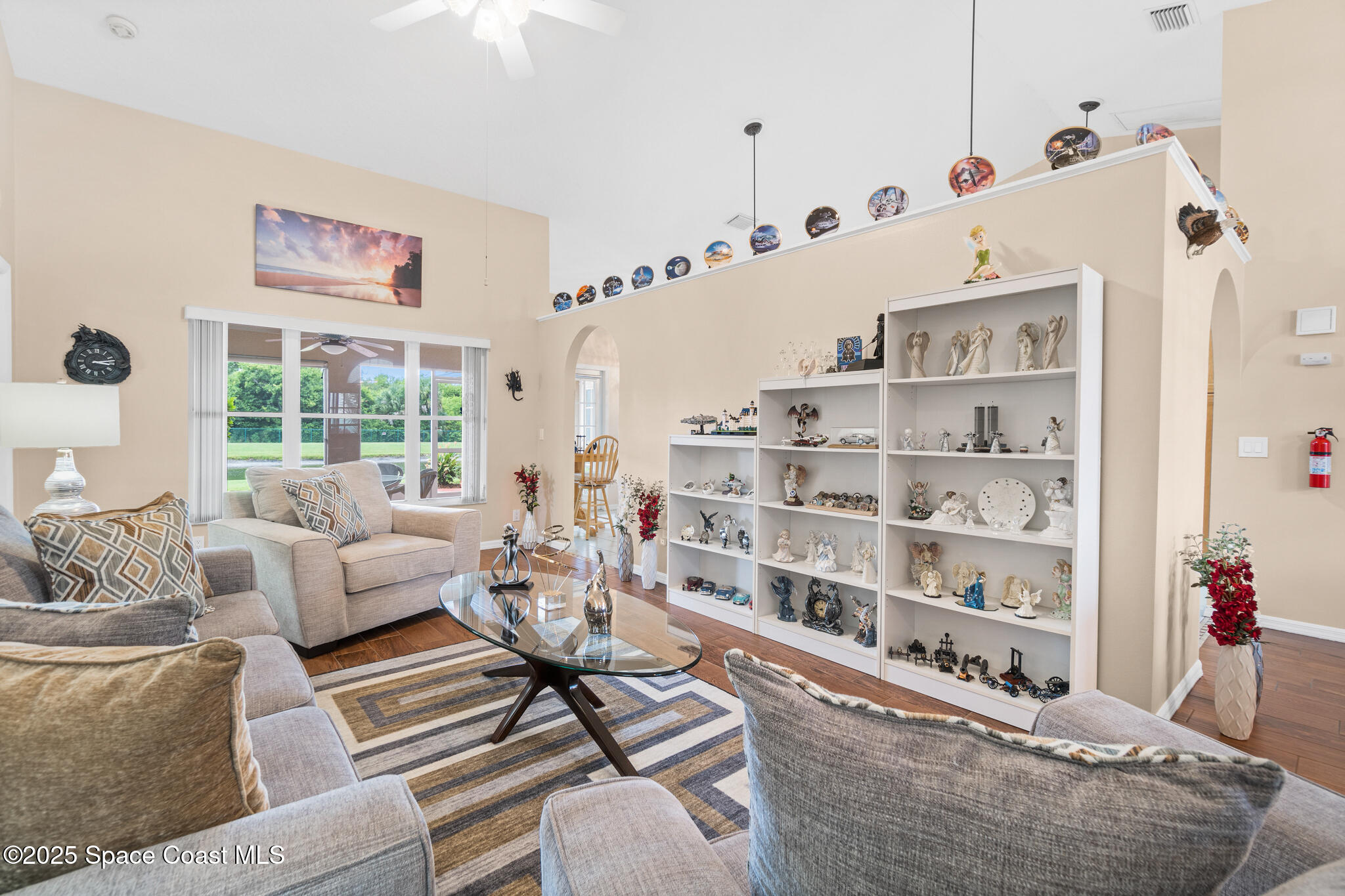 4808 Springwater Circle Melbourne, FL 32940 - Photo 8 of 38 a workspace with furniture and white walls