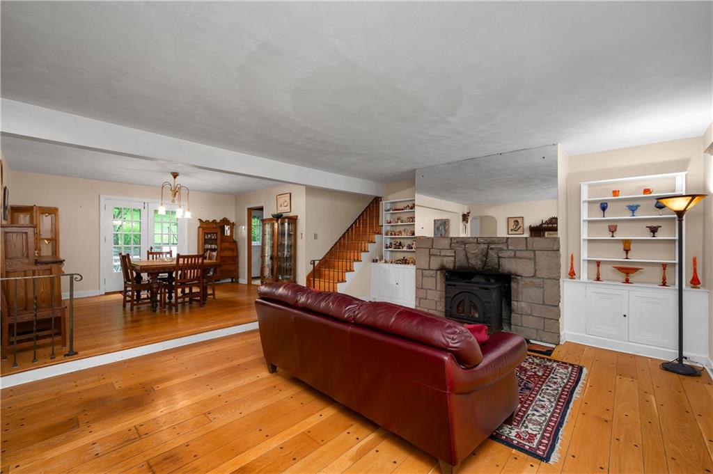 3871 Green Valley Road Pittsburgh, PA 15235 - Photo 7 of 50 Living Room with Pellet Stove