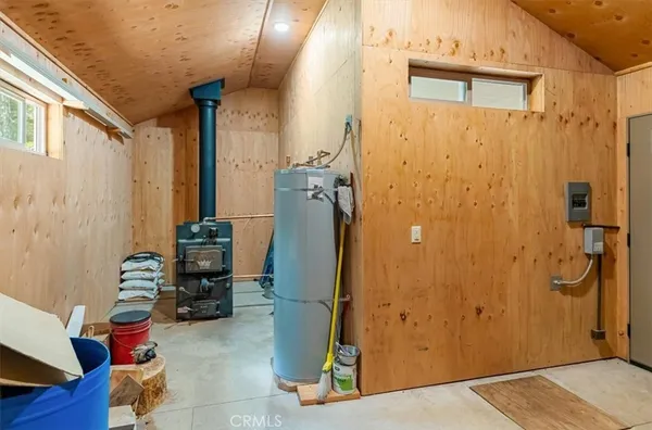 a view of a bathroom with a sink and glass door