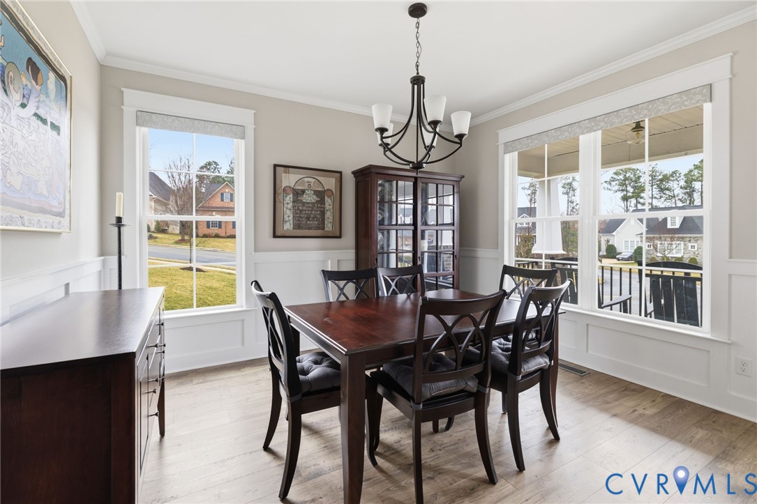 4001 Bircham Loop Midlothian, VA 23113 - Photo 15 of 33 a view of a dining room with furniture window and wooden floor