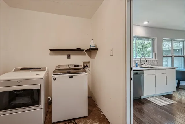 a kitchen with a stove and a microwave