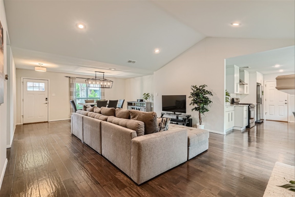 6614 Ashland Drive Austin, TX 78723 - Photo 6 of 28 a living room with furniture and a flat screen tv