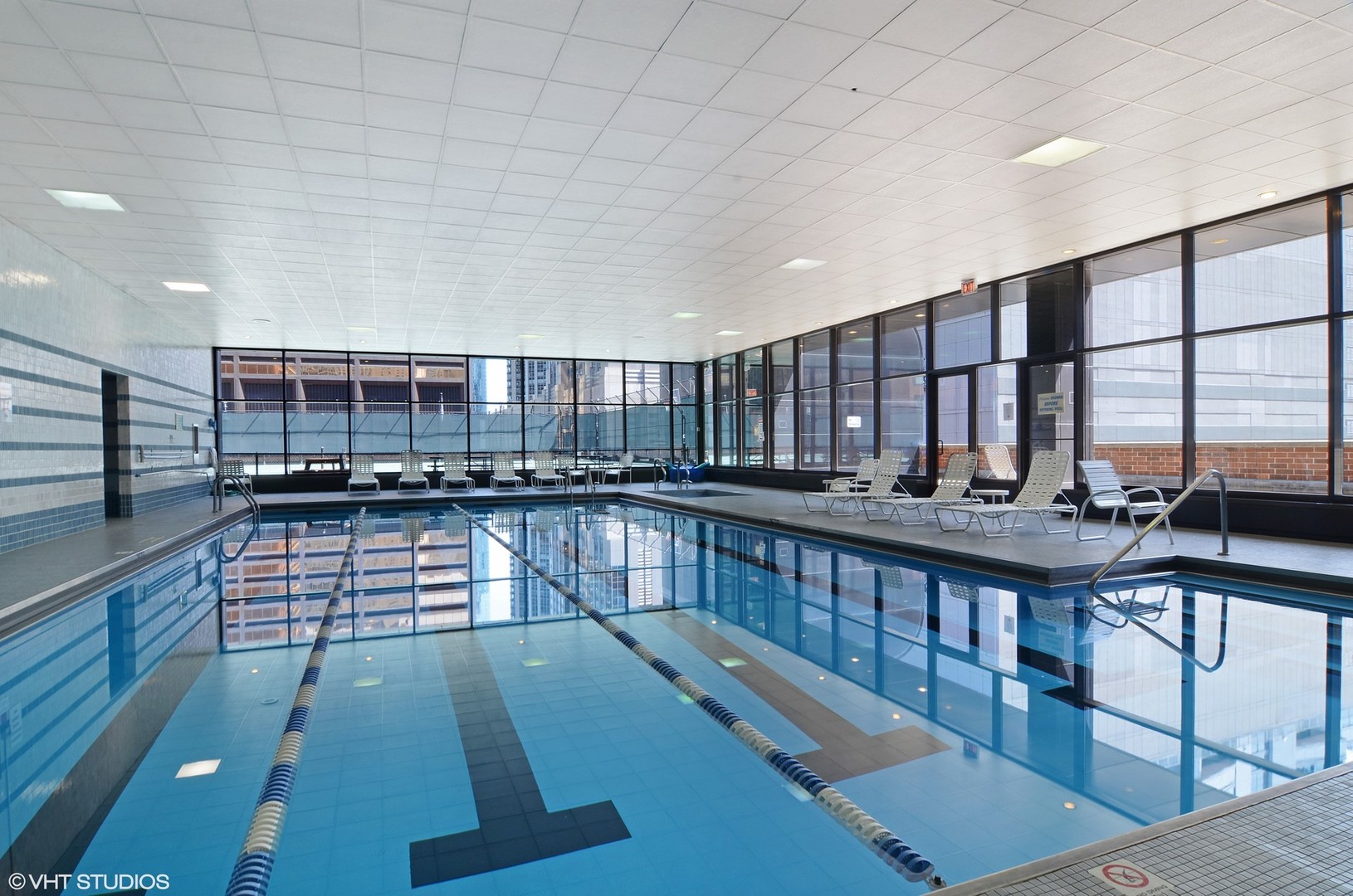 211 East Ohio Street, Unit 809 Chicago, IL 60611 - Photo 12 of 17 a view of a swimming pool with a balcony