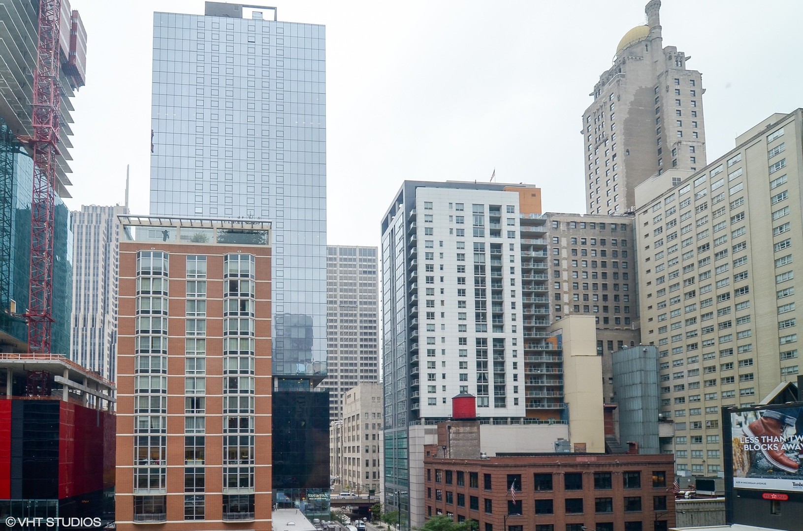 211 East Ohio Street, Unit 809 Chicago, IL 60611 - Photo 14 of 17 a view of a city with tall buildings