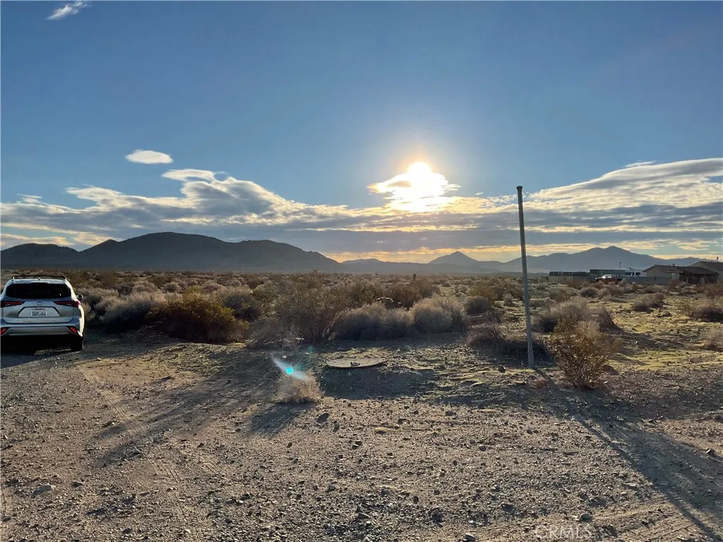1 Buffalo Trail Helendale, CA 92342 - Photo 4 of 10 a view of a car parked in back of a yard
