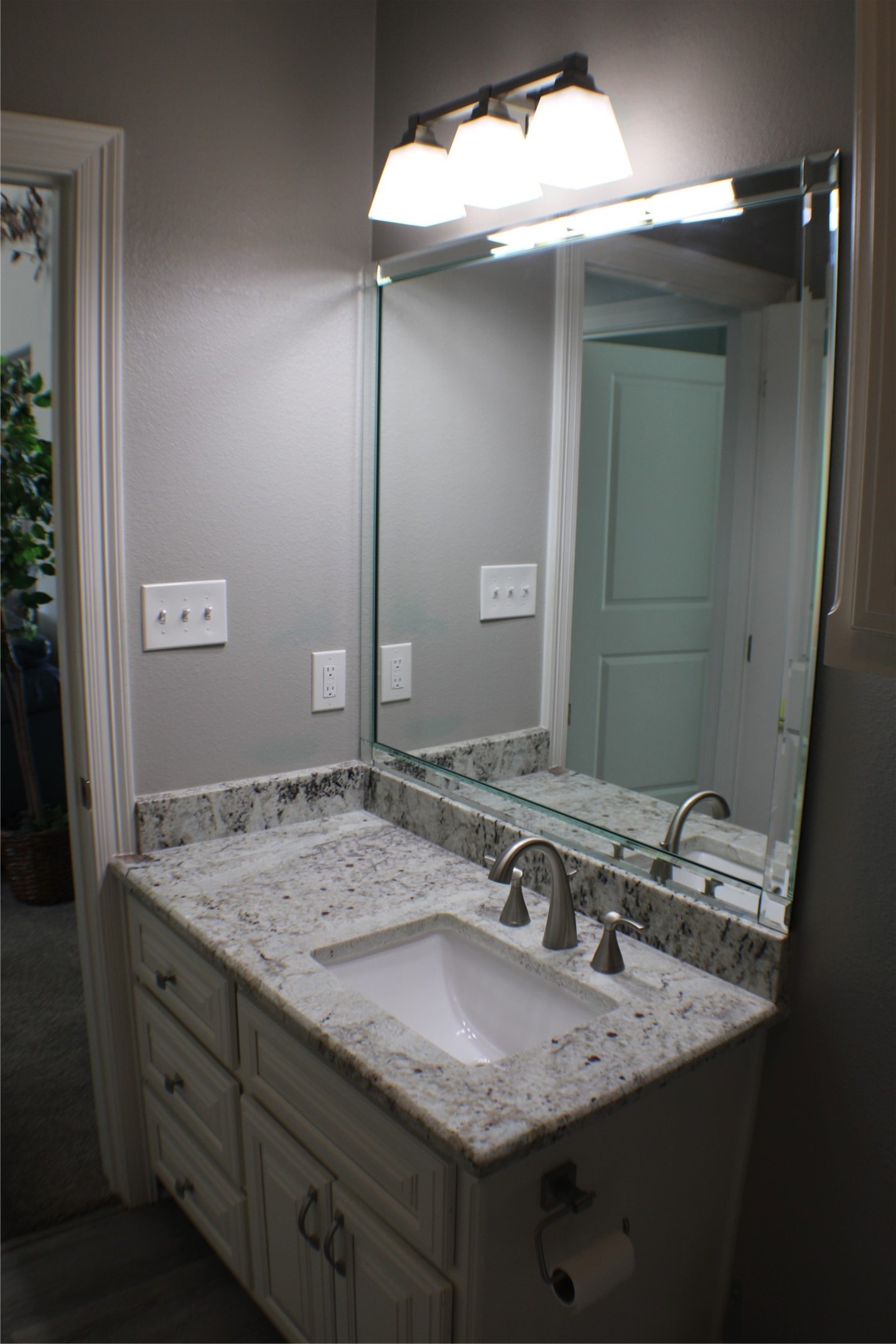5305 Wheeler Road Lumberton, TX 77657 - Photo 35 of 48 a bathroom with a granite countertop sink and a mirror