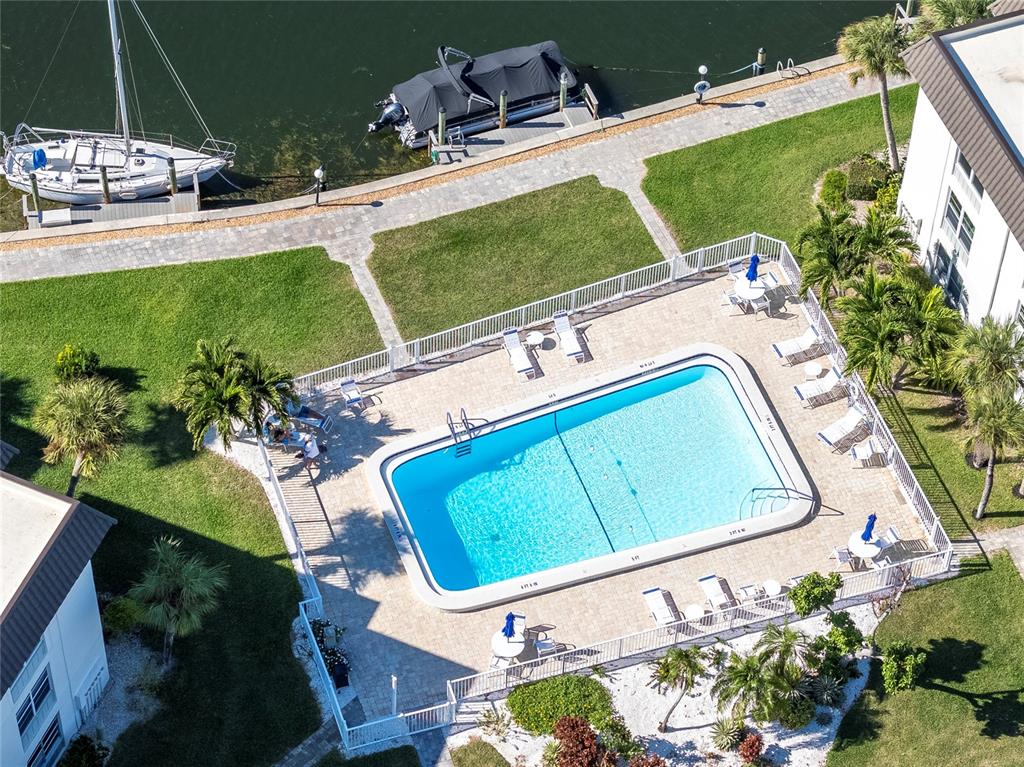 4390 Exeter Drive, Unit 305 Longboat Key, FL 34228 - Photo 33 of 78 an aerial view of a house