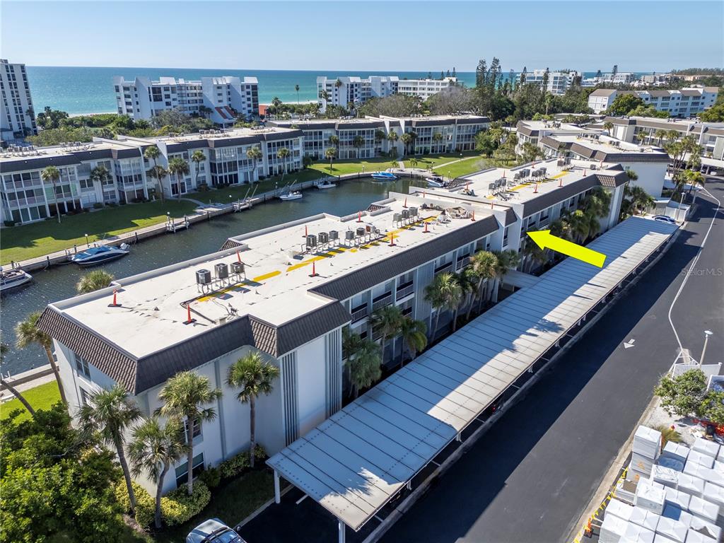 4390 Exeter Drive, Unit 305 Longboat Key, FL 34228 - Photo 40 of 78 a view of a chairs on the roof deck
