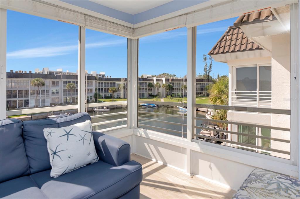 4390 Exeter Drive, Unit 305 Longboat Key, FL 34228 - Photo 4 of 78 a living room with furniture