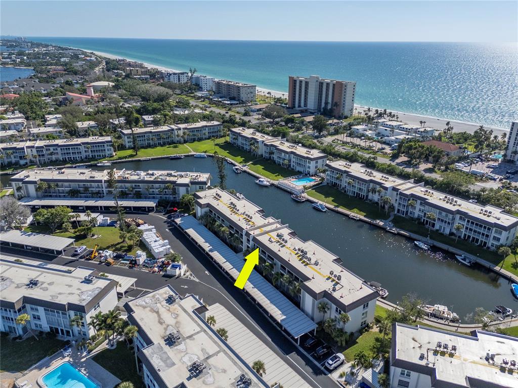 4390 Exeter Drive, Unit 305 Longboat Key, FL 34228 - Photo 44 of 78 a city view with tall buildings