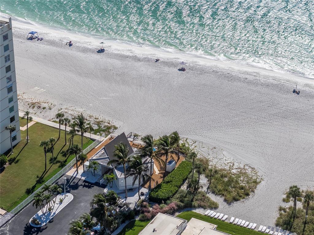 4390 Exeter Drive, Unit 305 Longboat Key, FL 34228 - Photo 59 of 78 a view of a garden
