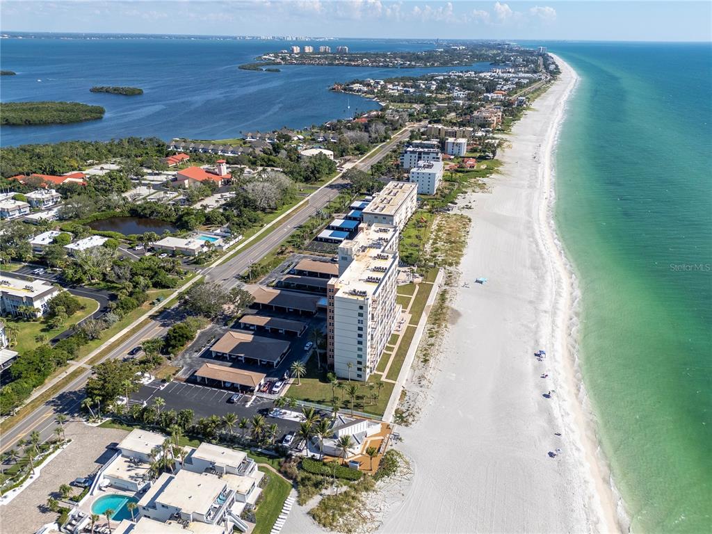 4390 Exeter Drive, Unit 305 Longboat Key, FL 34228 - Photo 62 of 78 a city view with tall buildings