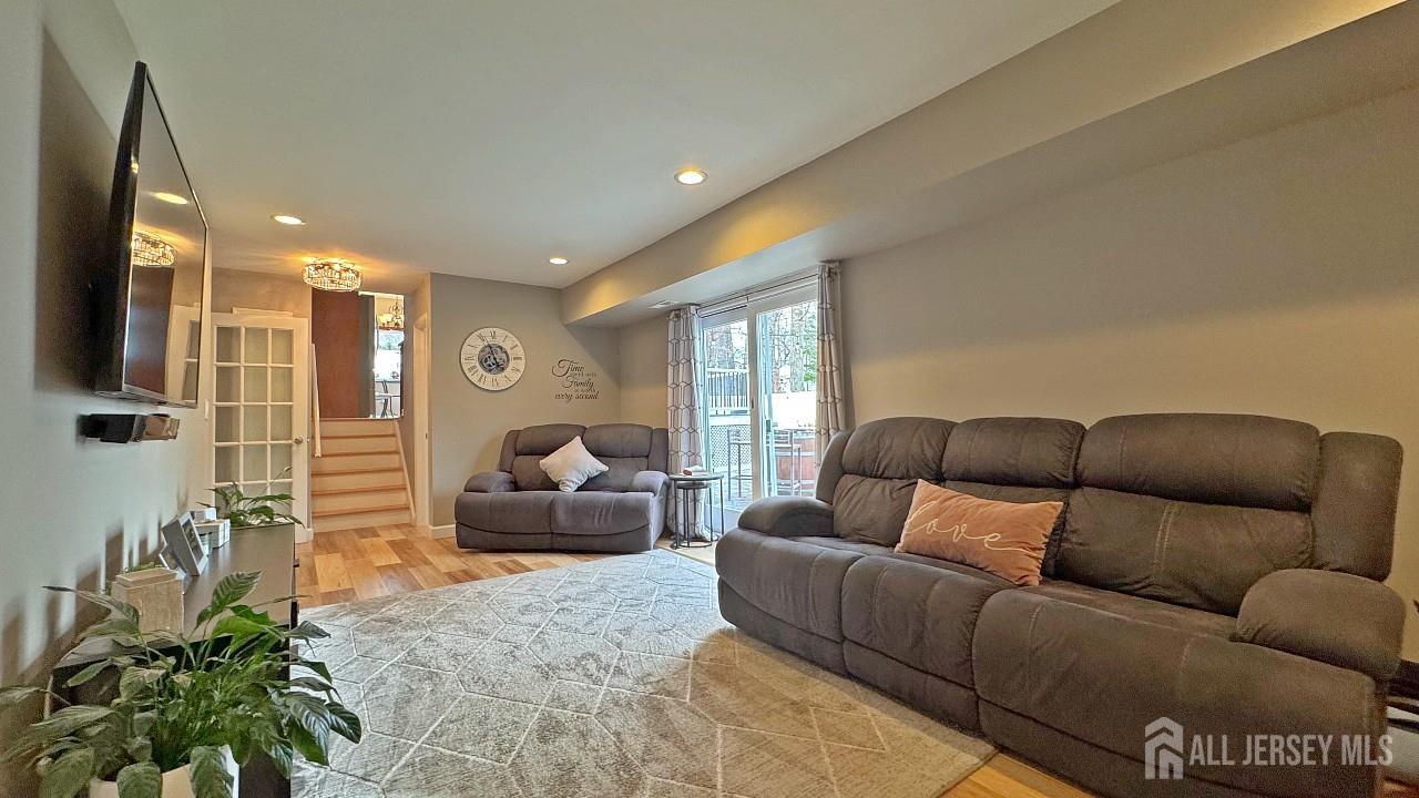 19 Norton Street Edison, NJ 08820 - Photo 15 of 29 a living room with furniture and a potted plant