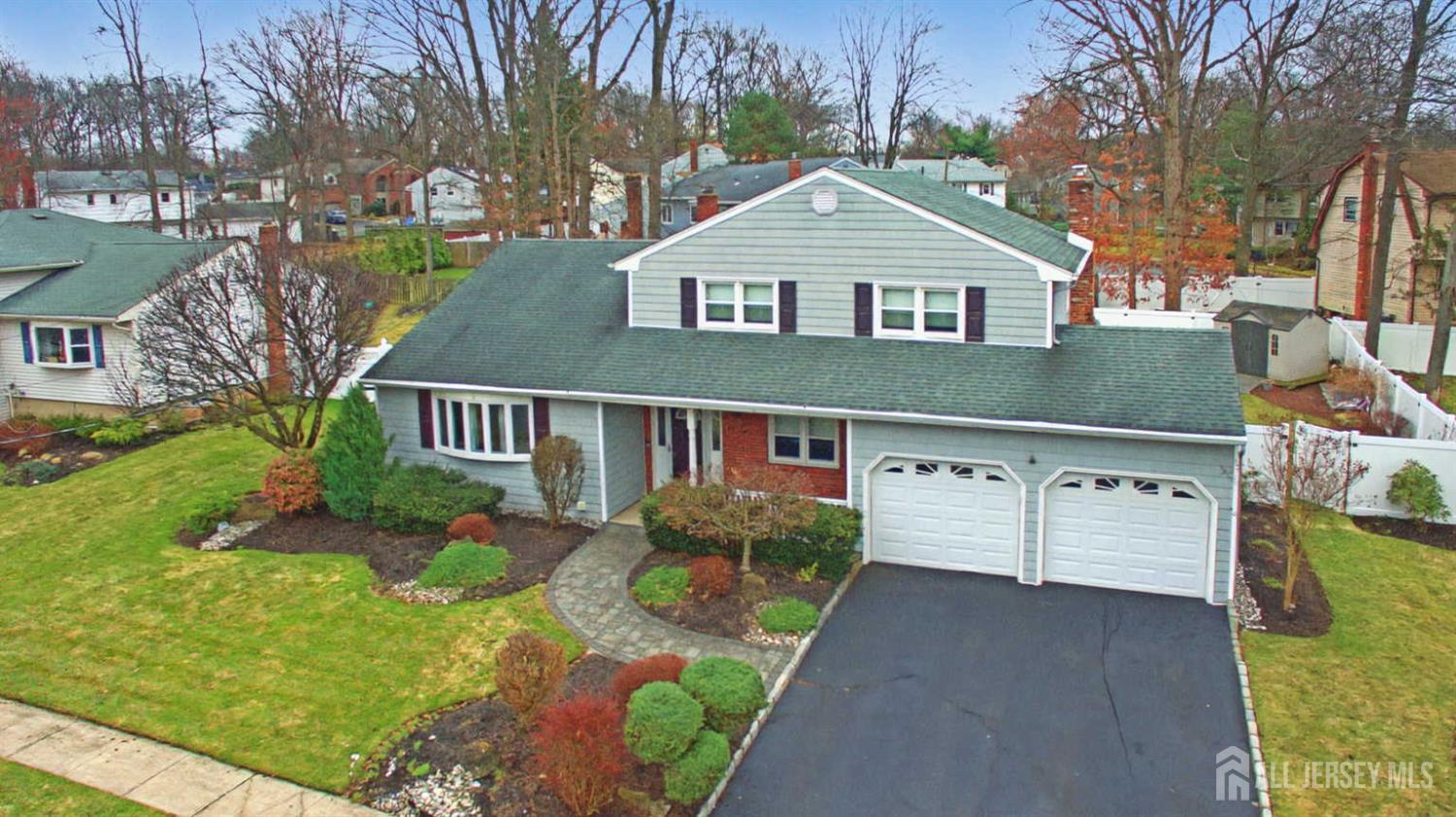 19 Norton Street Edison, NJ 08820 - Photo 2 of 29 a front view of a house with garden