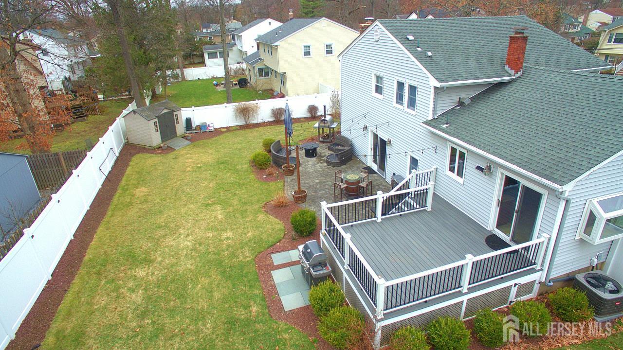 19 Norton Street Edison, NJ 08820 - Photo 25 of 29 an aerial view of a house with swimming pool