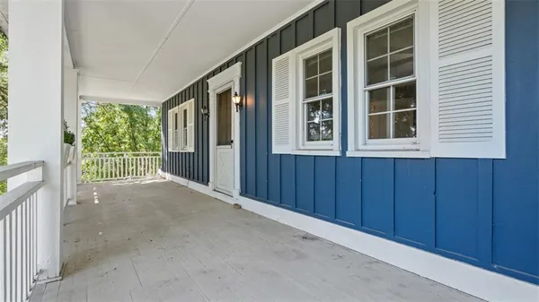 a view of a balcony with an entryway