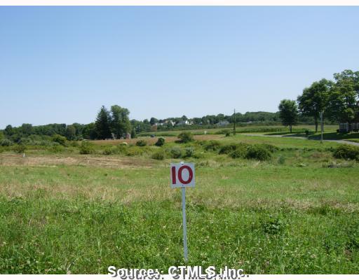 Lot10 Windy Ridge Lane Watertown, CT 06795 - Photo 1 of 1 a view of green field with trees in the background