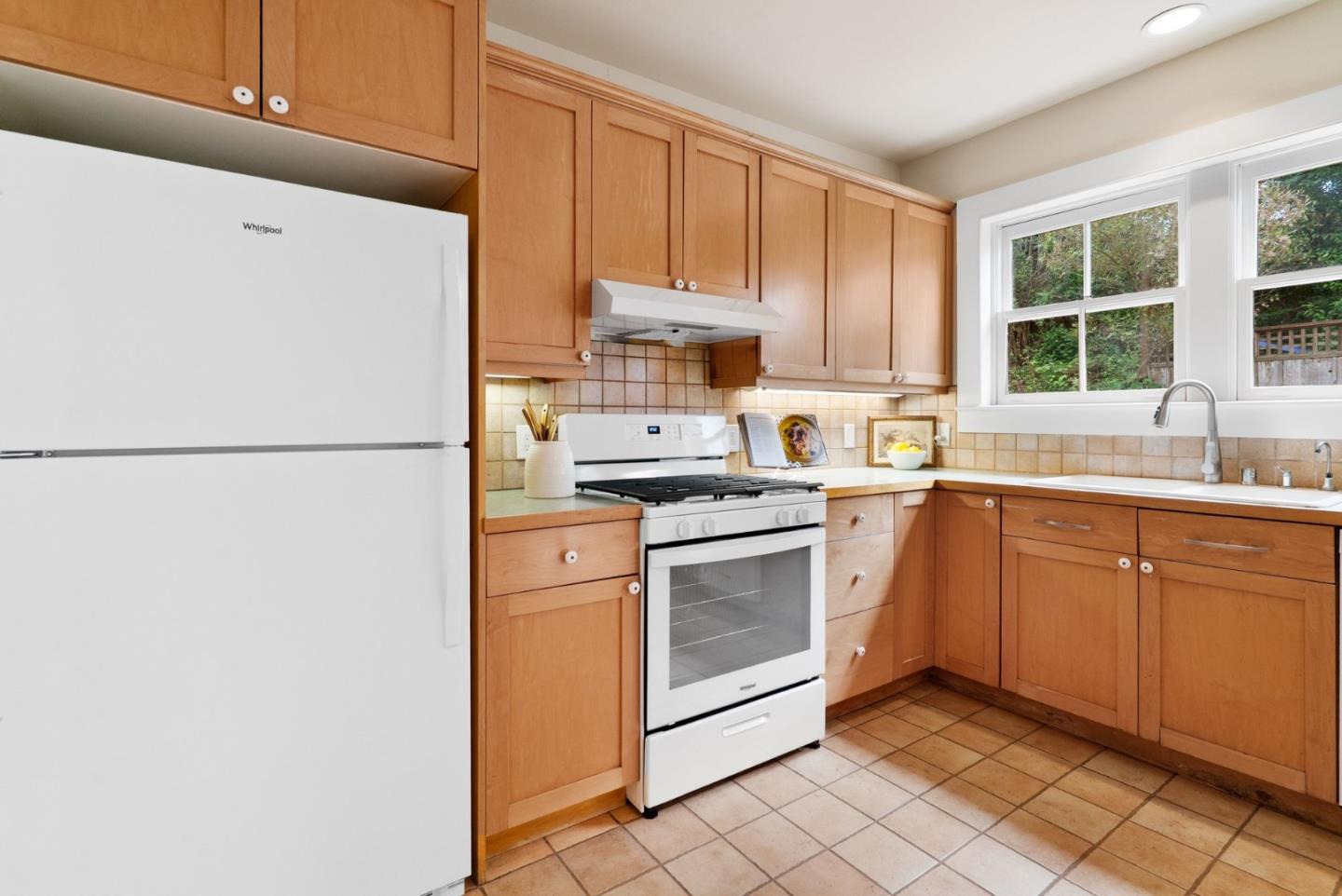 2900 South Main Street Soquel, CA 95073 - Photo 12 of 41 a kitchen with stainless steel appliances granite countertop a refrigerator sink and stove