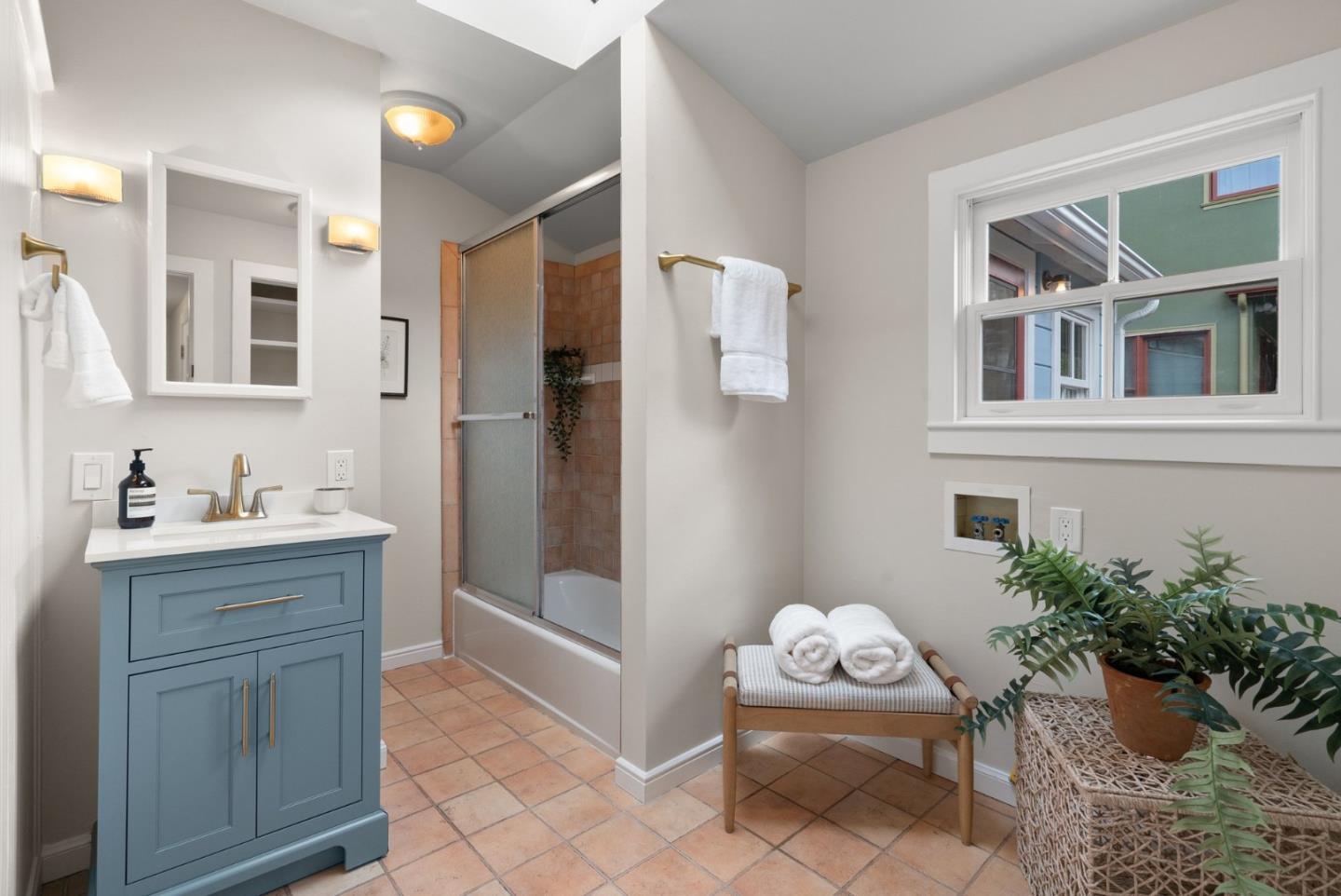 2900 South Main Street Soquel, CA 95073 - Photo 20 of 41 a bathroom with a sink mirror and tub