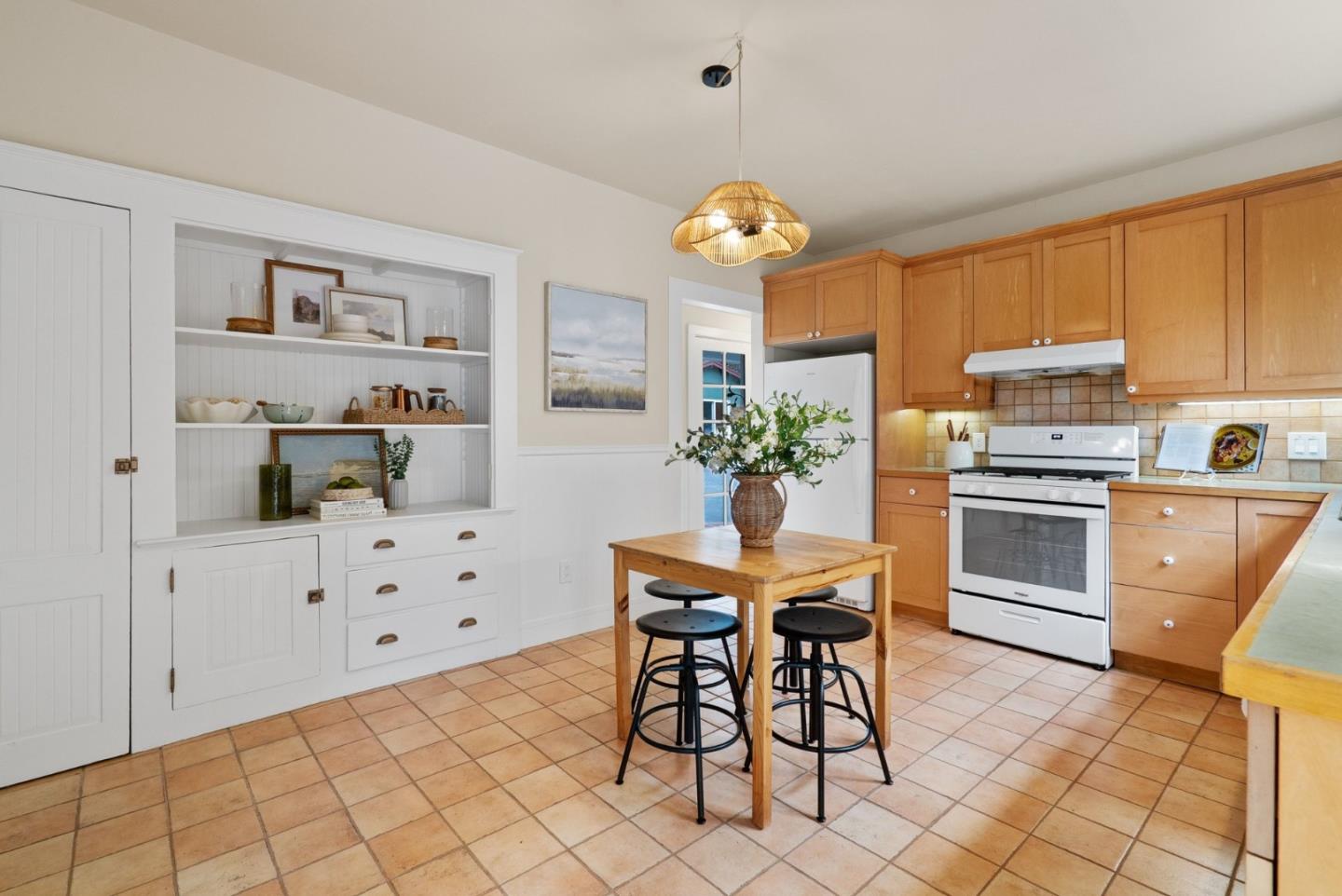 2900 South Main Street Soquel, CA 95073 - Photo 8 of 41 a kitchen with stainless steel appliances a stove a chimney a sink and cabinets