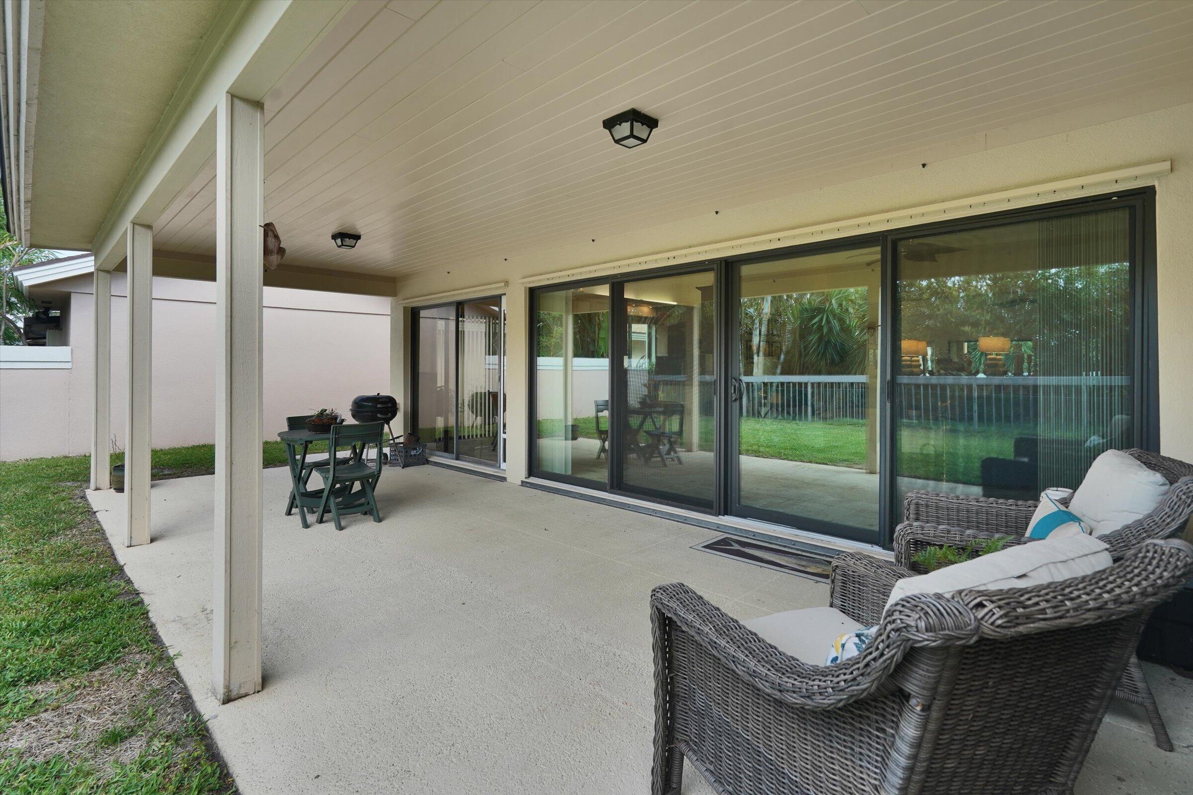316 River Edge Road Jupiter, FL 33477 - Photo 28 of 53 Extended Roof over Patio