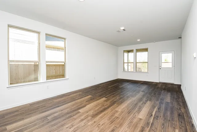 a view of a kitchen from the hallway