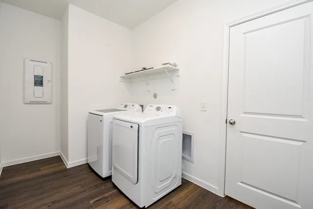 a utility room with dryer and washer