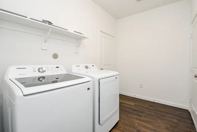 a view of a hallway with a white door