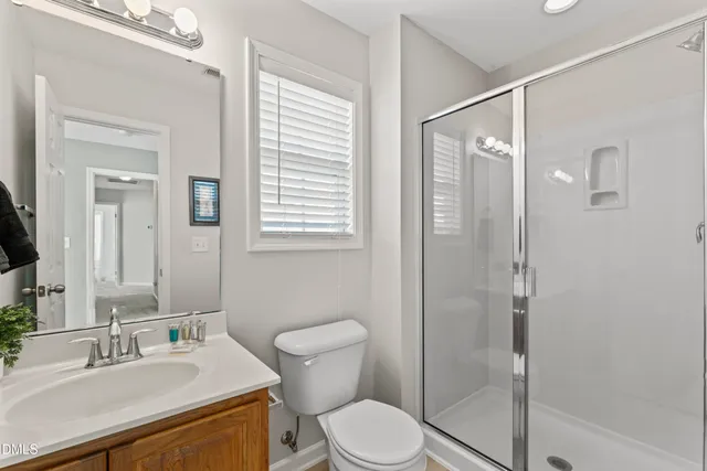 a view of a swimming pool with a yard