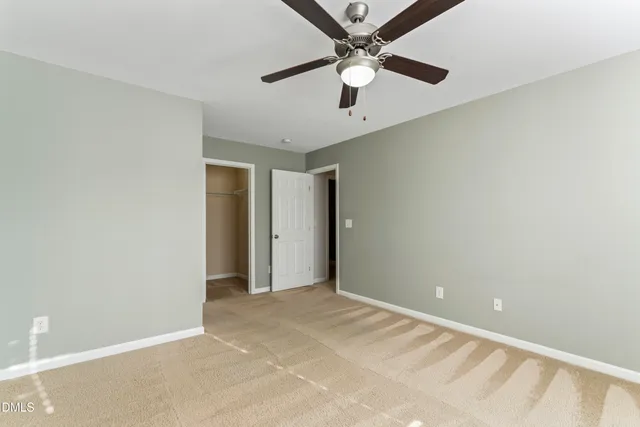 an aerial view of a house with swimming pool
