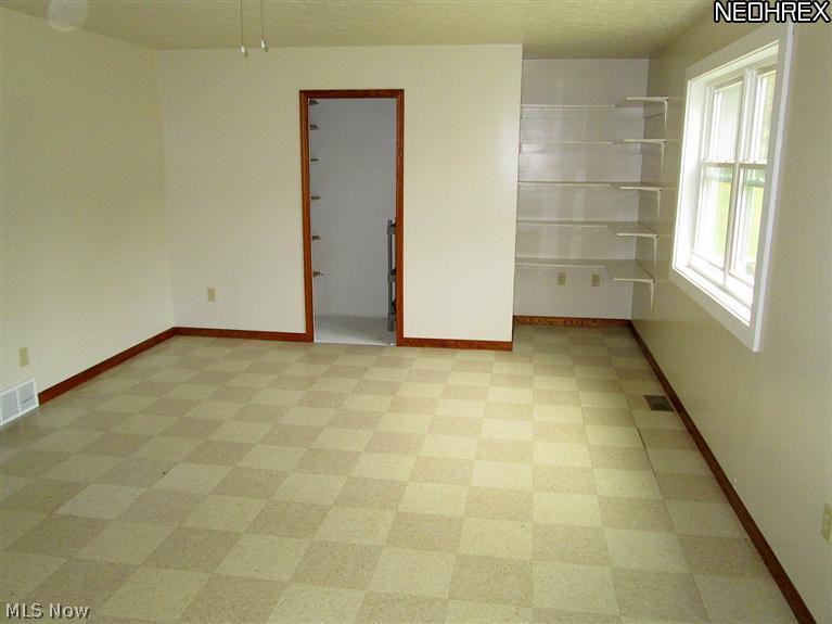 3959 South Funk Road Wooster, OH 44691 - Photo 6 of 11 This first floor room (23 X 13) has a closet and most certainly can be used as a first floor master bedroom.