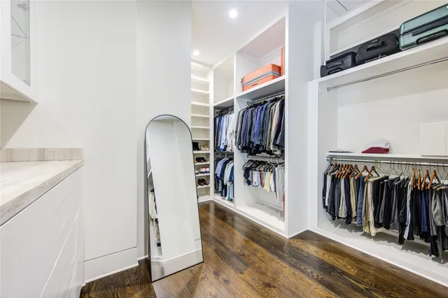 a living room with furniture rug and a large window
