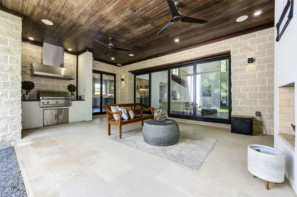 a view of a chairs and tables in the balcony