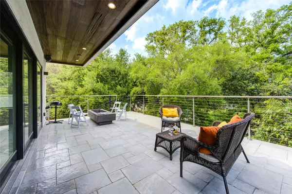 a bathroom with a granite countertop sink and mirror