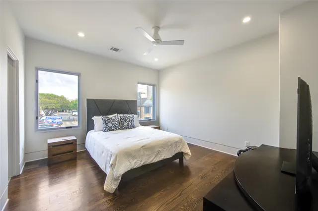 a view of a balcony with yard