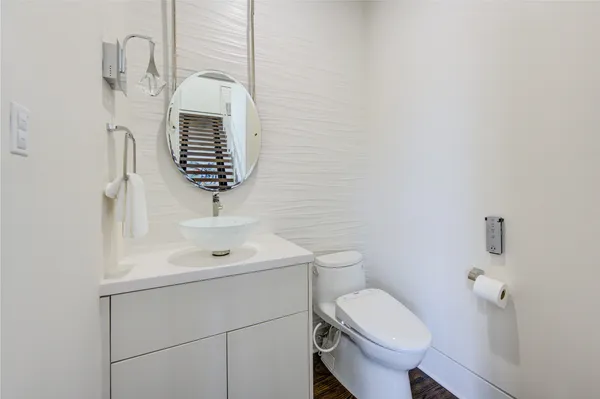 a front view of house with yard and trees