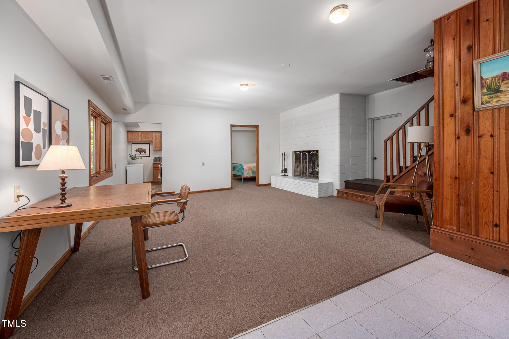 7723 Johnson Mill Road Bahama, NC 27503 - Photo 30 of 58 Lower Level Living Room and Fireplace