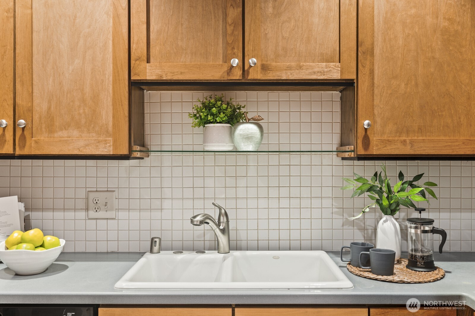 2350 10th Avenue East, Unit 227 Seattle, WA 98102 - Photo 13 of 34 a bathroom with a sink and a mirror