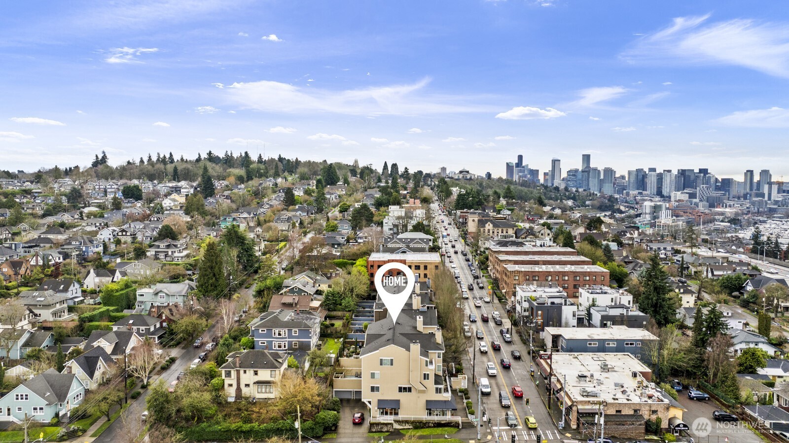 2350 10th Avenue East, Unit 227 Seattle, WA 98102 - Photo 33 of 34 an aerial view of residential houses with city view