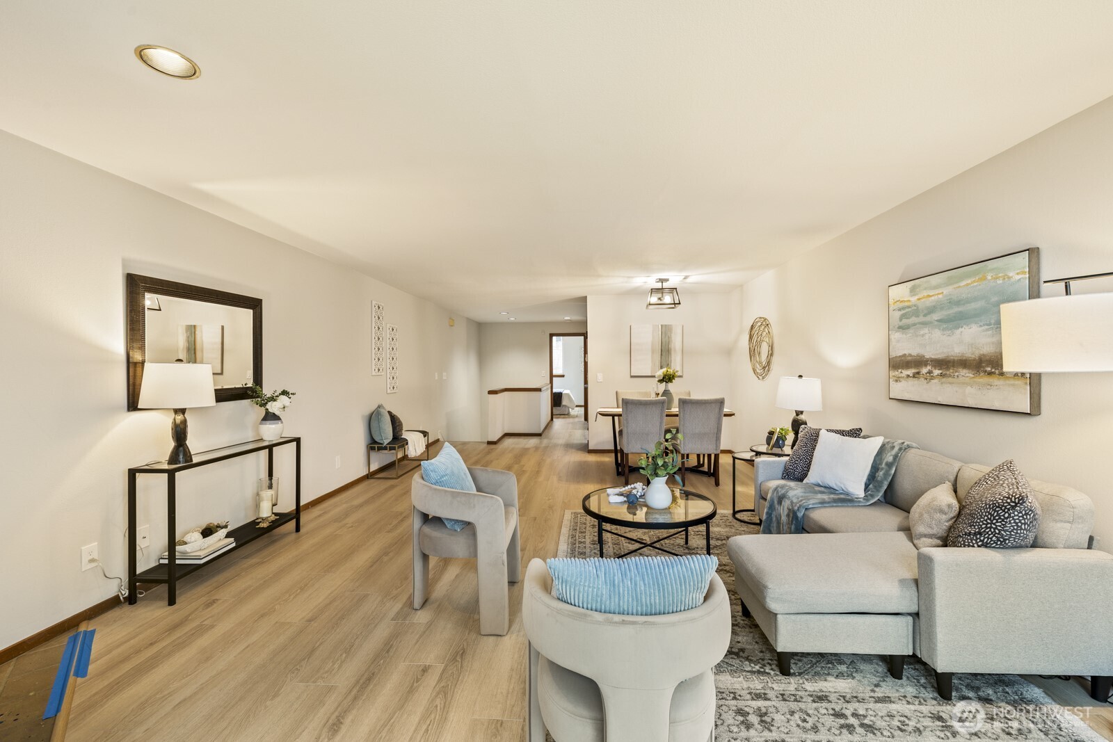 2350 10th Avenue East, Unit 227 Seattle, WA 98102 - Photo 7 of 34 a living room with furniture and a wooden floor