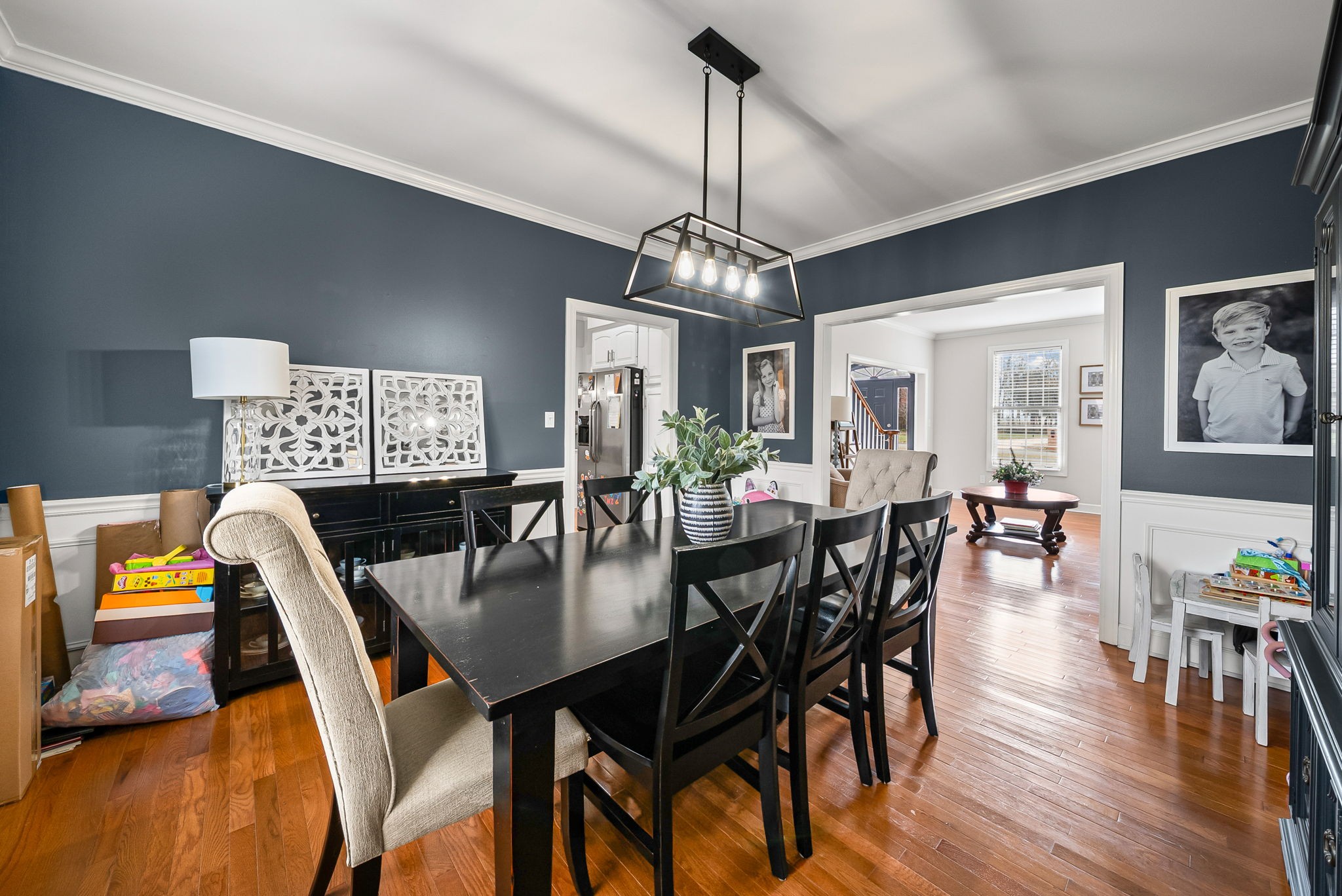 508 Sheffield Road Hopkinsville, KY 42240 - Photo 12 of 65 a dining room with furniture a chandelier and wooden floor