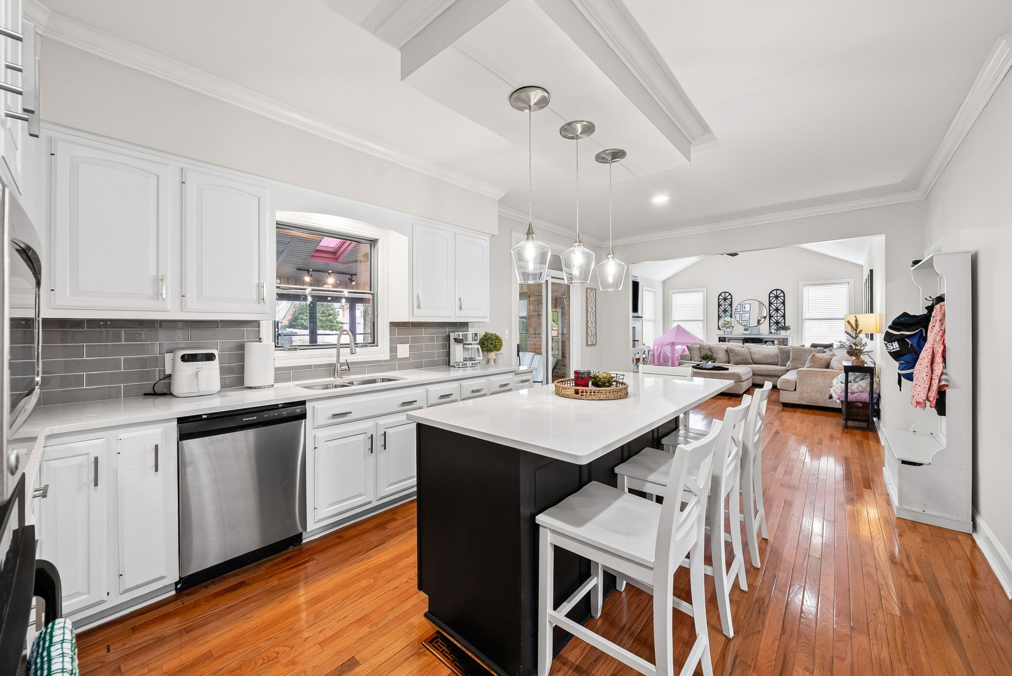 508 Sheffield Road Hopkinsville, KY 42240 - Photo 13 of 65 a open kitchen with stainless steel appliances granite countertop a lot of counter space and wooden floor